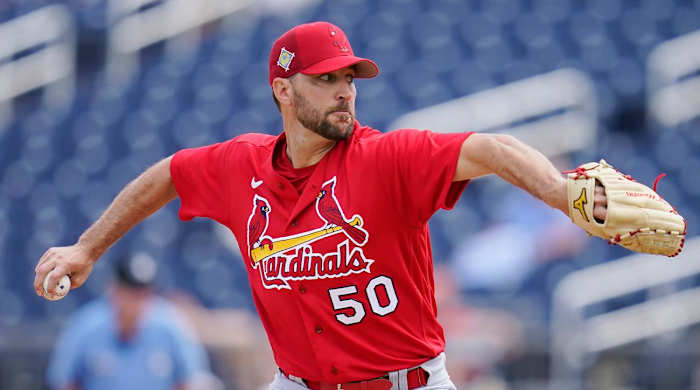 St. Louis Cardinals starting pitcher Adam Wainwright (50) pitches in the first inning of a spring training baseball game against the Houston Astros, Wednesday, March 23, 2022, in West Palm Beach, Fla.